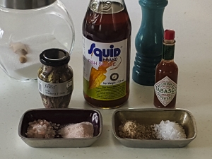 The salt in the bowls from left to right is Himalayan Pink Rock Salt, (ground and in crystal form), smoked sea salt and Maldon sea salt